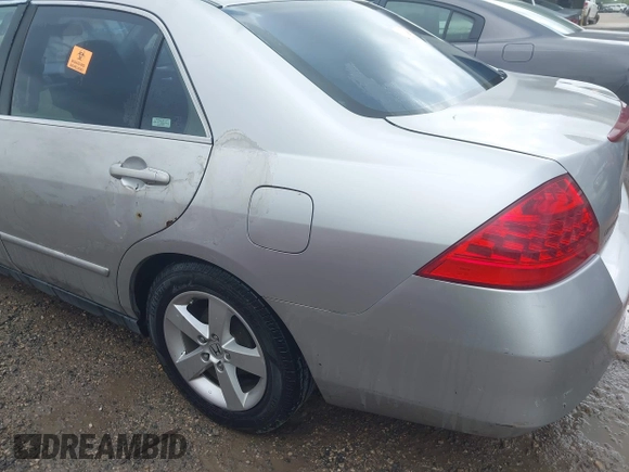 2007 Honda Accord LX with VIN JHMCM564X7C021650, listed as a IAAI auction lot 42576746 with 261,206 mi miles and . Bid and sale history available at DreamBid. Image 12.