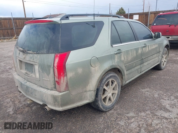 2004 Cadillac SRX with VIN 1GYDE63A340128713, listed as a IAAI auction lot 41788552 with 158,606 mi miles. Bid and sale history available at carsss.com. Image 4.