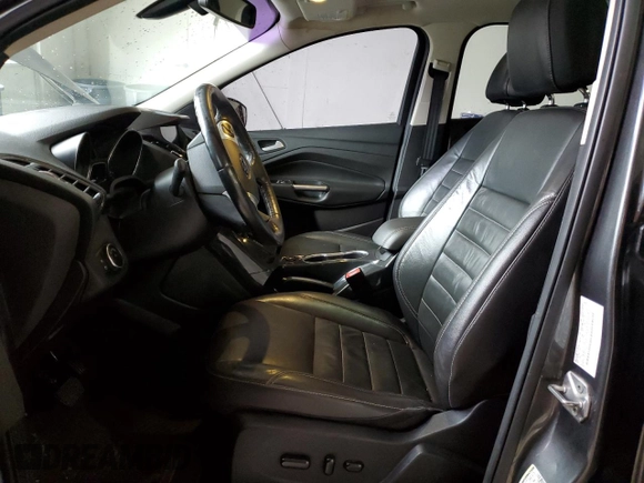 2016 Ford Escape Titanium with VIN 1FMCU9JX9GUB94754, listed as a Copart auction lot 52679435 with 176,075 mi miles and Salvage Title. Bid and sale history available at DreamBid. Image 7.