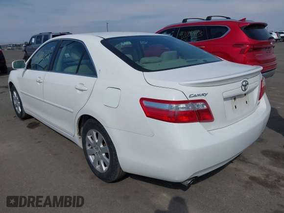 2007 Toyota Camry LE with VIN JTNBK46K973018732, listed as a IAAI auction lot 42000392 with 263,788 mi miles and . Bid and sale history available at DreamBid. Image 3.