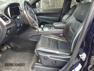 2014 Jeep Grand Cherokee Overland with VIN 1C4RJFCT2EC146306, listed as a Copart auction lot 51469995 with 150,849 mi miles and Salvage Title. Bid and sale history available at DreamBid. Image 7.