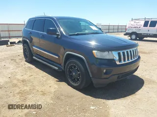 2011 Jeep Grand Cherokee Laredo z VIN 1J4RR4GG5BC572068, wystawiony jako IAAI lot #42310806 z przebiegiem 178 844 mil mil oraz . Historia ofert i sprzedaży dostępna na DreamBid. Obrazek 1.