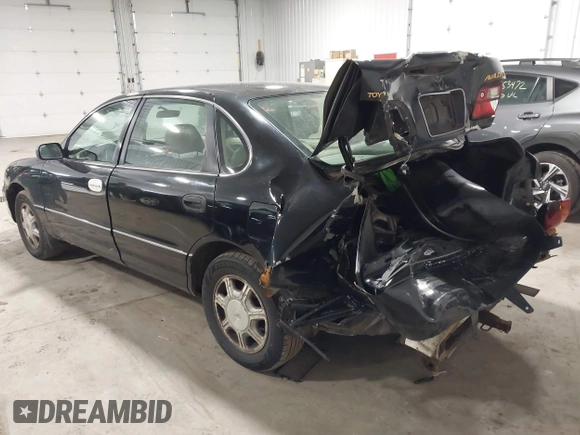1998 Toyota Avalon XL with VIN 4T1BF18B5WU229340, listed as a IAAI auction lot 41957632 with 212,657 mi miles and . Bid and sale history available at DreamBid. Image 3.