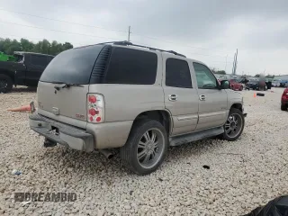2004 GMC Yukon SLT with VIN 1GKEC13Z34R313210, listed as a Copart auction lot 51150575 with 328,961 mi miles and Salvage Title. Bid and sale history available at carsss.com. Image 3.