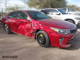 2018 Kia Optima SX with VIN 5XXGW4L24JG192556, listed as a IAAI auction lot 41125379 with 1 mi miles. Bid and sale history available at carsss.com. Image 1.