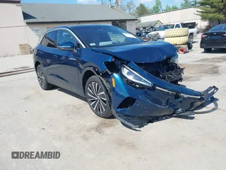 2023 Volkswagen ID.4 Pro S Plus z VIN 1V2JNPE87PC052763, wystawiony jako IAAI lot #42201920 z przebiegiem 16 742 mil mil oraz . Historia ofert i sprzedaży dostępna na DreamBid. Obrazek 1.