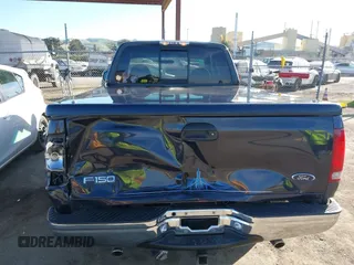 1999 Ford F-150 XL with VIN 1FTRX17L4XKA58054, listed as a IAAI auction lot 41647530 with 225,632 mi miles. Bid and sale history available at carsss.com. Image 16.