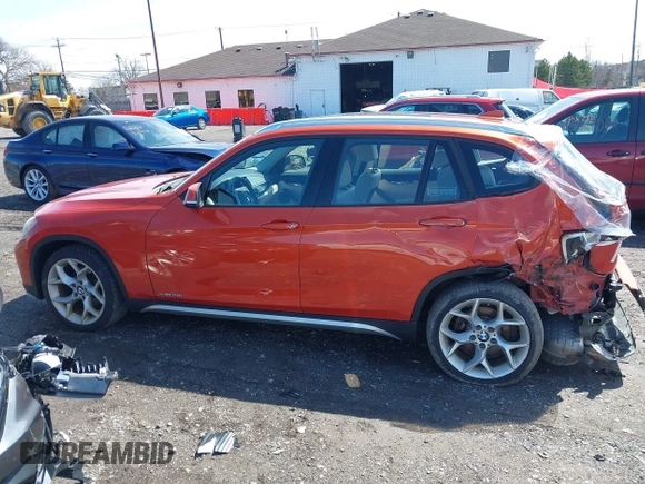 2015 BMW X1 xDrive28i with VIN WBAVL1C57FVY27822, listed as a IAAI auction lot 41977545 with 76,211 mi miles. Bid and sale history available at carsss.com. Image 14.