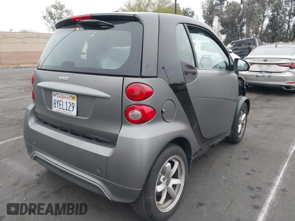 2015 Smart fortwo Passion with VIN WMEEJ3BA1FK787744, listed as a IAAI auction lot 42095001 with 43,370 mi miles and . Bid and sale history available at DreamBid. Image 4.