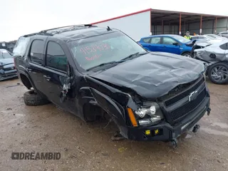 2011 Chevrolet Tahoe LT z VIN 1GNSKBE0XBR277154, wystawiony jako IAAI lot #41539036 z przebiegiem 196 099 mil mil oraz . Historia ofert i sprzedaży dostępna na DreamBid. Obrazek 1.