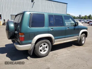1999 Isuzu Trooper S с VIN JACDJ58X6X7913469, выставлен на аукционе Copart как лот 74690934 с пробегом 202 379 миль миль и Списание • Salvage title. История ставок и продаж доступна на DreamBid. Изображение 3.