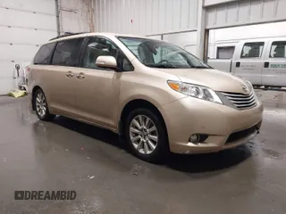 2014 Toyota Sienna Ltd with VIN 5TDDK3DCXES074614, listed as a IAAI auction lot 41691123 with 117,571 mi miles. Bid and sale history available at carsss.com. Image 1.