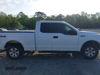 2016 Ford F-150 XLT with VIN 1FTFX1EF4GKE50550, listed as a IAAI auction lot 41974498 with 154,409 mi miles. Bid and sale history available at carsss.com. Image 14.
