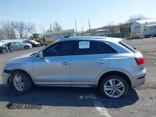2016 Audi Q3 Premium Plus with VIN WA1EFCFS1GR016996, listed as a IAAI auction lot 41942380 with 90,852 mi miles and . Bid and sale history available at DreamBid. Image 14.
