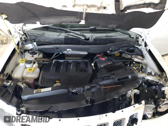 2017 Jeep Compass Sport with VIN 1C4NJCBB1HD141280, listed as a Copart auction lot 58989715 with 61,744 mi miles and Salvage title. Bid and sale history available at DreamBid. Image 12.