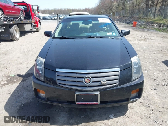 2003 Cadillac CTS with VIN 1G6DM57N430125143, listed as a IAAI auction lot 42142953 with 85,913 mi miles. Bid and sale history available at carsss.com. Image 6.