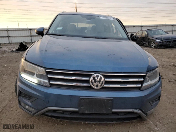 2020 Volkswagen Tiguan SE with VIN 3VV2B7AXXLM181344, listed as a Copart auction lot 87182794 with 62,145 mi miles and Salvage Title. Bid and sale history available at carsss.com. Image 5.