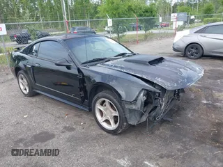 2003 Ford Mustang GT Deluxe z VIN 1FAFP42X23F342631, wystawiony jako IAAI lot #42105227 z przebiegiem 199 951 mil mil oraz . Historia ofert i sprzedaży dostępna na DreamBid. Obrazek 1.