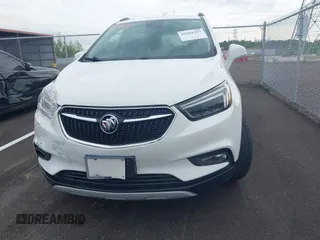 2019 Buick Encore Essence with VIN KL4CJGSM2KB876329, listed as a IAAI auction lot 42101397 with 84,020 mi miles. Bid and sale history available at carsss.com. Image 11.