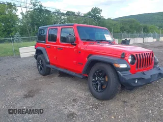 2020 Jeep Wrangler Unlimited Freedom with VIN 1C4HJXDG5LW282721, listed as a IAAI auction lot 42268956 with 47,245 mi miles and . Bid and sale history available at DreamBid. Image 1.