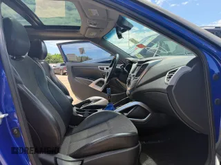 2013 Hyundai Veloster w/Black Int z VIN KMHTC6AD1DU094781, wystawiony jako Copart lot #60271115 z przebiegiem 122 541 mil mil oraz Szkoda całkowita • Salvage title. Historia ofert i sprzedaży dostępna na DreamBid. Obrazek 5.