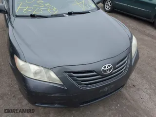2007 Toyota Camry CE with VIN 4T1BE46K37U669145, listed as a IAAI auction lot 41927728 with 999,999 mi miles. Bid and sale history available at carsss.com. Image 6.