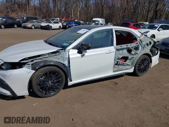 2022 Toyota Camry TRD with VIN 4T1KZ1AK9NU071181, listed as a IAAI auction lot 41758219 with 103,200 mi miles and . Bid and sale history available at DreamBid. Image 6.