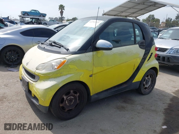 2010 Smart fortwo Pure z VIN WMEEJ3BA2AK365443, wystawiony jako IAAI lot #42293722 z przebiegiem 88 076 mil mil oraz . Historia ofert i sprzedaży dostępna na DreamBid. Obrazek 2.