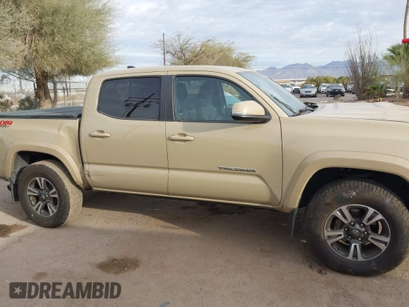 2017 Toyota Tacoma SR5 with VIN 3TMCZ5AN2HM063328, listed as a IAAI auction lot 41541775 with 137,610 mi miles and . Bid and sale history available at DreamBid. Image 14.