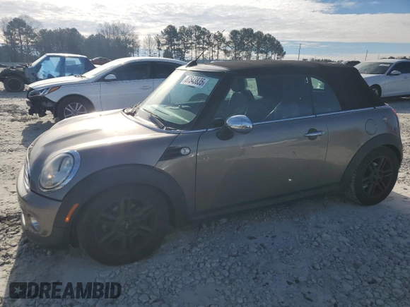 2011 MINI Convertible with VIN WMWZN3C53BT133576, listed as a Copart auction lot 87543835 with 69,999 mi miles and Salvage title. Bid and sale history available at DreamBid. Image 1.