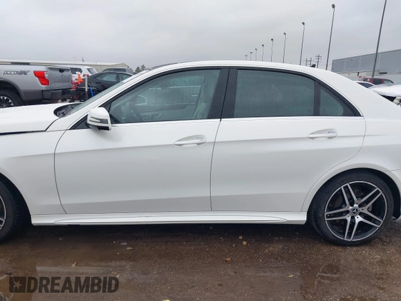 2014 Mercedes-Benz E 550 Sport with VIN WDDHF9BB3EB017140, listed as a IAAI auction lot 41424799 with 32,537 mi miles and . Bid and sale history available at DreamBid. Image 15.