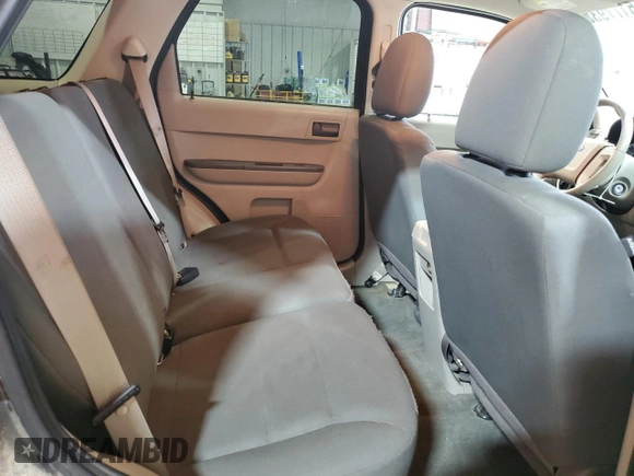 2011 Ford Escape XLS z VIN 1FMCU9C77BKC43662, wystawiony jako Copart lot #51779335 z przebiegiem 104 548 mil mil oraz Szkoda całkowita • Salvage title. Historia ofert i sprzedaży dostępna na DreamBid. Obrazek 11.