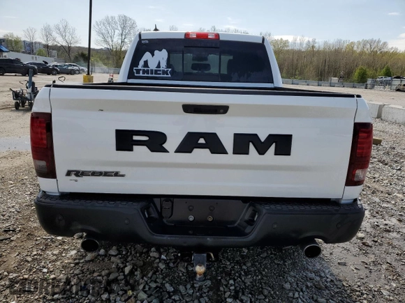 2017 Ram 1500 Rebel z VIN 1C6RR6YT2HS693644, wystawiony jako Copart lot #52570215 z przebiegiem 127 023 mil mil oraz Nie do naprawy • Non repairable. Historia ofert i sprzedaży dostępna na DreamBid. Obrazek 6.