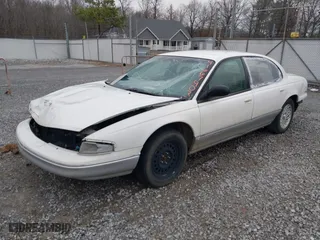 1997 Chrysler LHS with VIN 2C3HC56FXVH592484, listed as a IAAI auction lot 41667403 with 139,051 mi miles. Bid and sale history available at carsss.com. Image 2.