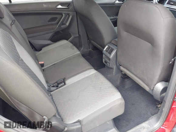 2018 Volkswagen Tiguan S with VIN 3VV1B7AX3JM045193, listed as a IAAI auction lot 42311886 with 69,049 mi miles and . Bid and sale history available at DreamBid. Image 8.