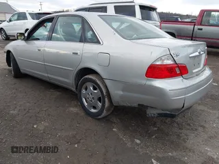 2004 Toyota Avalon XL with VIN 4T1BF28B64U386765, listed as a IAAI auction lot 41298352 with 201,539 mi miles and . Bid and sale history available at DreamBid. Image 3.