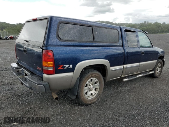 2001 GMC Sierra 1500 SLE z VIN 1GTEK19T11Z241405, wystawiony jako Copart lot #67396344 z przebiegiem 136 051 mil mil oraz Szkoda całkowita • Salvage title. Historia ofert i sprzedaży dostępna na DreamBid. Obrazek 3.