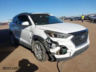 2019 Hyundai Tucson Value with VIN KM8J33A49KU979927, listed as a IAAI auction lot 41818355 with 96,208 mi miles. Bid and sale history available at carsss.com. Image 1.