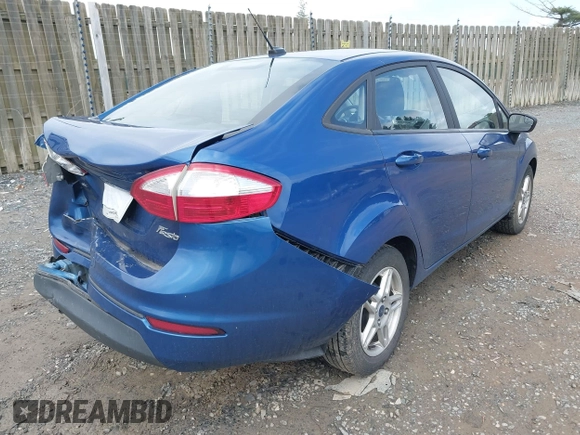 2018 Ford Fiesta SE z VIN 3FADP4BJXJM126168, wystawiony jako IAAI lot #42255261 z przebiegiem 121 248 mil mil oraz . Historia ofert i sprzedaży dostępna na DreamBid. Obrazek 4.