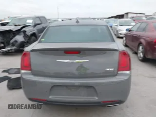 2018 Chrysler 300 S with VIN 2C3CCABG6JH152659, listed as a IAAI auction lot 41777468 with 101,743 mi miles and . Bid and sale history available at DreamBid. Image 16.