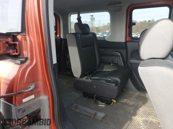 2004 Honda Element LX with VIN 5J6YH17344L008053, listed as a Copart auction lot 82022094 with 128,665 mi miles and Salvage Title. Bid and sale history available at DreamBid. Image 10.