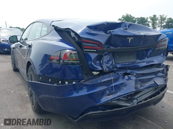 2022 Tesla Model S z VIN 5YJSA1E55NF493604, wystawiony jako IAAI lot #42503731 z przebiegiem 37 961 mil mil oraz . Historia ofert i sprzedaży dostępna na DreamBid. Obrazek 3.