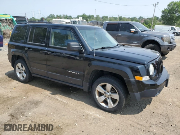 2014 Jeep Patriot Latitude with VIN 1C4NJRFB3ED761587, listed as a Copart auction lot 60554245 with 138,763 mi miles and Salvage title. Bid and sale history available at DreamBid. Image 4.