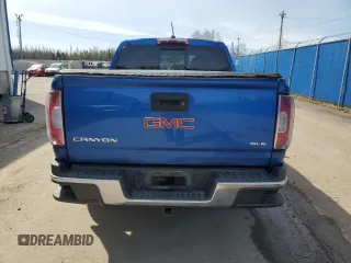 2018 GMC Canyon 4WD SLE z VIN 1GTG6CEN0J1262745, wystawiony jako Copart lot #54671585 z przebiegiem Nie podano mil oraz Szkoda całkowita • Salvage title. Historia ofert i sprzedaży dostępna na DreamBid. Obrazek 6.