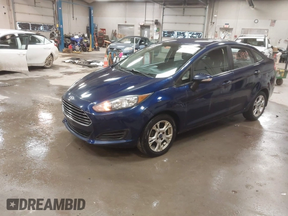 2016 Ford Fiesta SE z VIN 3FADP4BJ0GM112689, wystawiony jako IAAI lot #41231939 z przebiegiem 151 844 mil mil oraz . Historia ofert i sprzedaży dostępna na DreamBid. Obrazek 2.