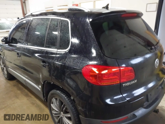 2013 Volkswagen Tiguan SE z VIN WVGBV7AX3DW508802, wystawiony jako IAAI lot #41471406 z przebiegiem 102 426 mil mil oraz . Historia ofert i sprzedaży dostępna na DreamBid. Obrazek 3.