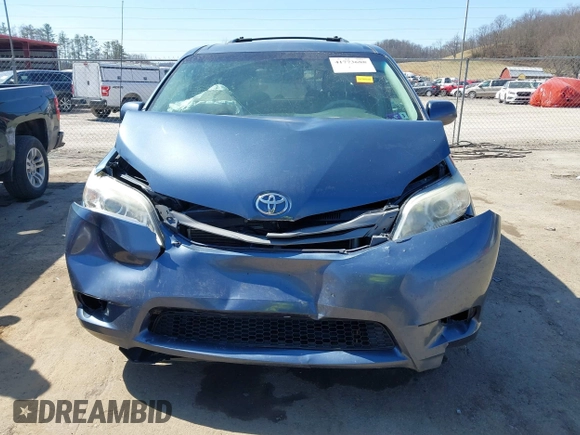 2013 Toyota Sienna XLE AAS with VIN 5TDYK3DC0DS398381, listed as a IAAI auction lot 41773688 with 169,055 mi miles. Bid and sale history available at carsss.com. Image 12.
