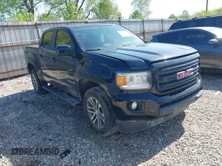 2015 GMC Canyon 2WD SLE with VIN 1GTG5BE32F1231709, listed as a IAAI auction lot 42143190 with 96,063 mi miles and . Bid and sale history available at DreamBid. Image 1.