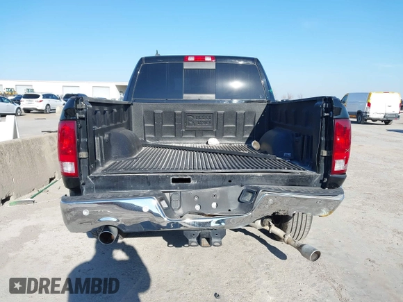 2015 Ram 1500 Outdoorsman z VIN 1C6RR6LT7FS592085, wystawiony jako IAAI lot #41384731 z przebiegiem 134 384 mil mil oraz . Historia ofert i sprzedaży dostępna na DreamBid. Obrazek 16.