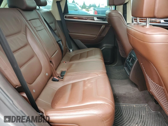 2012 Volkswagen Touareg Sport with VIN WVGFK9BP4CD001860, listed as a Copart auction lot 55090375 with 153,456 mi miles and Salvage title. Bid and sale history available at DreamBid. Image 11.